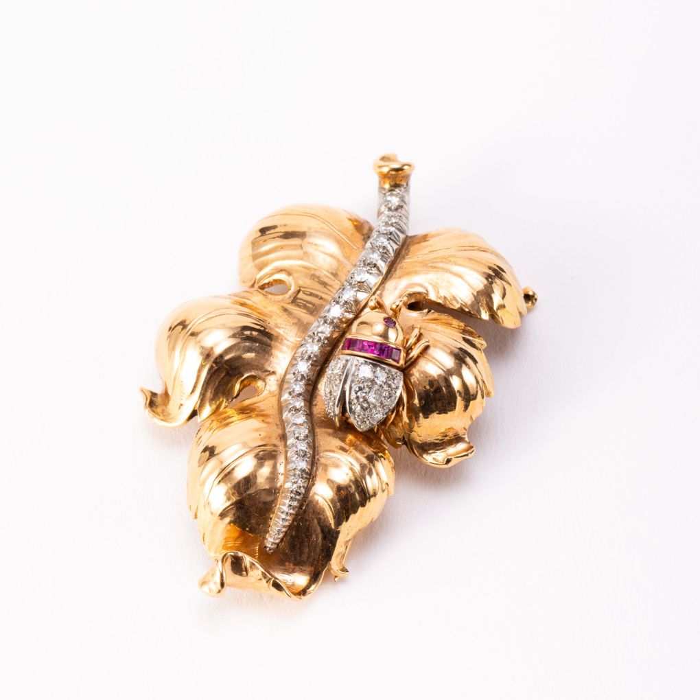 Yellow and White Gold leaf brooch set with Diamonds and Rubies